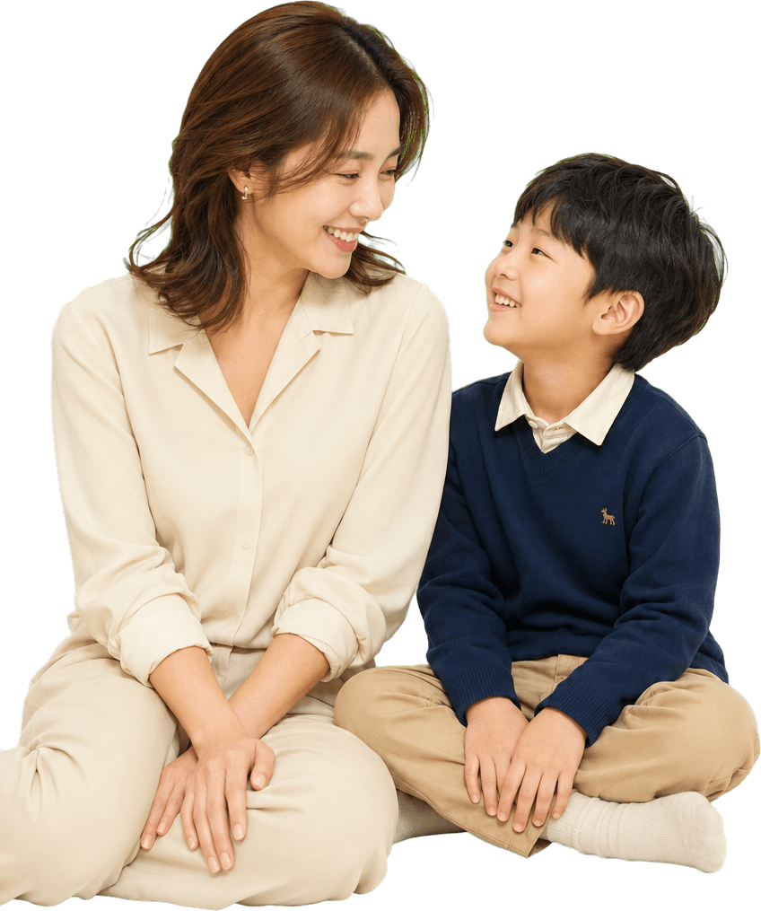 마주 보고 앉은 부모와 아이